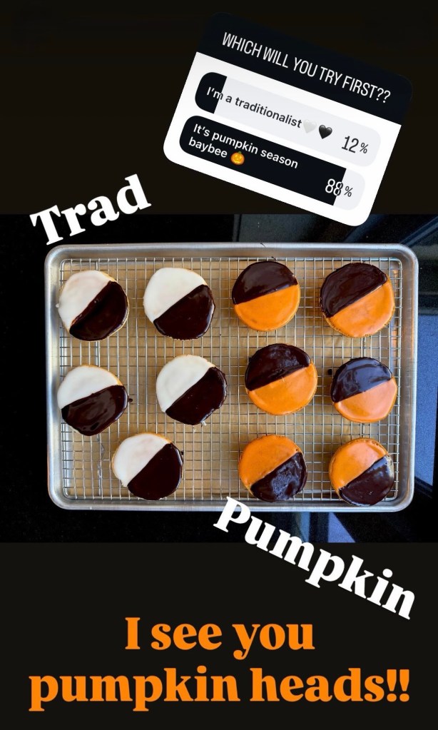 A tray of cookies featuring two designs: half chocolate and half orange pumpkin, alongside cookies dipped in white and dark chocolate. Text overlay asks viewers which flavor they would try first.